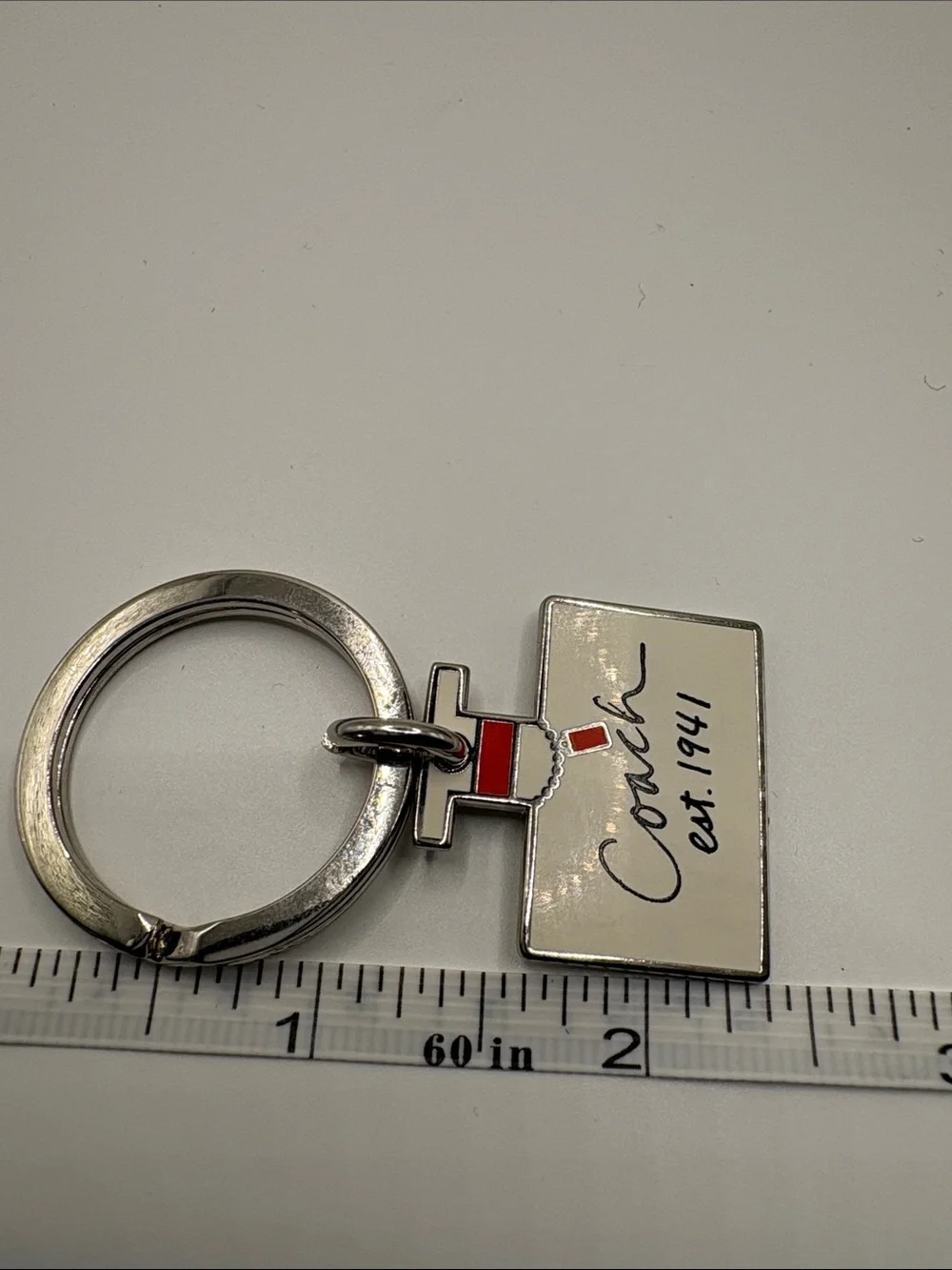 Coach Enamel Perfume Bottle Keyring in White and Red